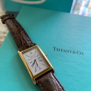 Tiffany and co. Gold steel portfolio Swiss watch &